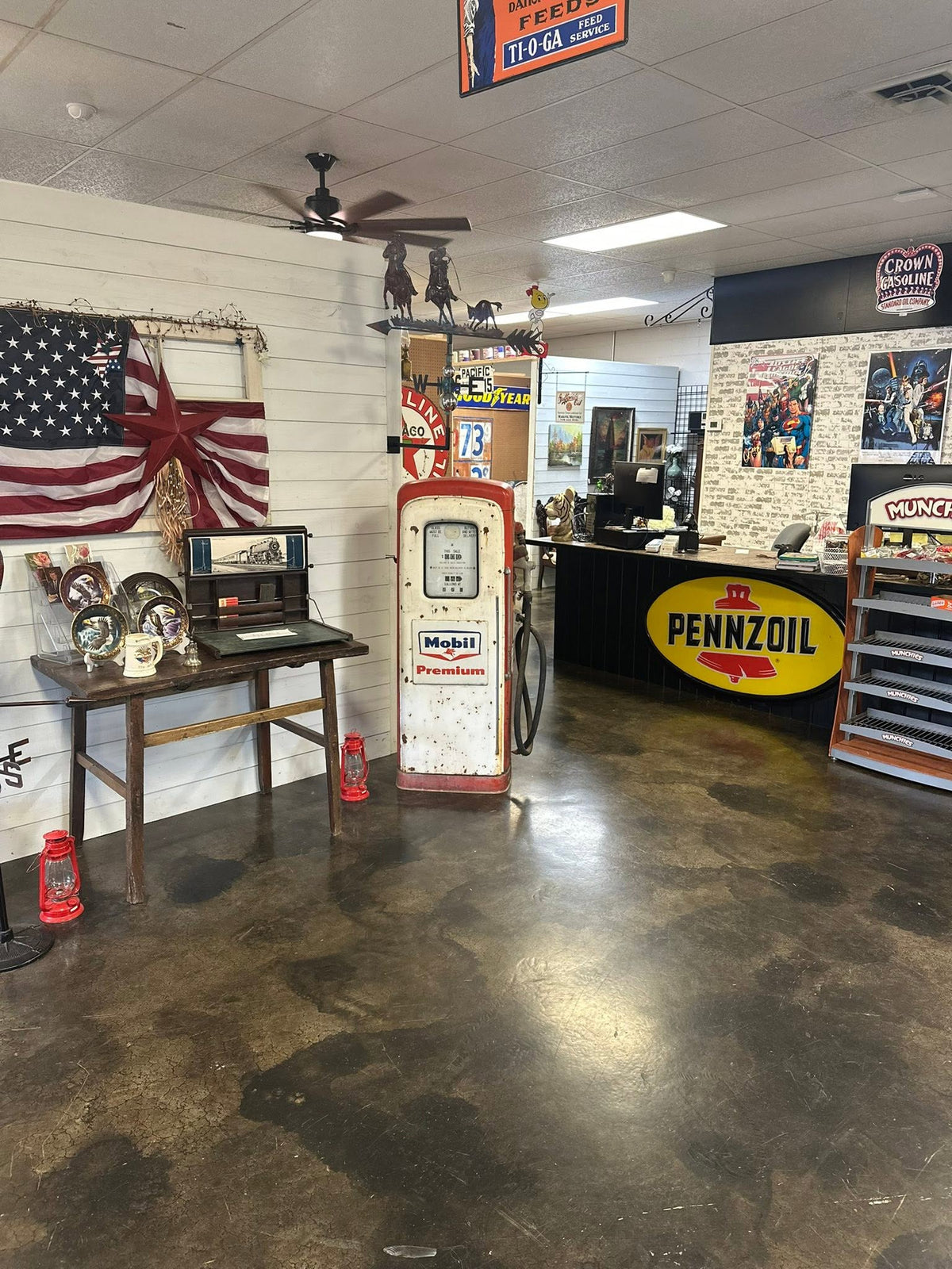 Vintage Mobil Premium gas pump and Pennzoil sign inside Patina & Grace